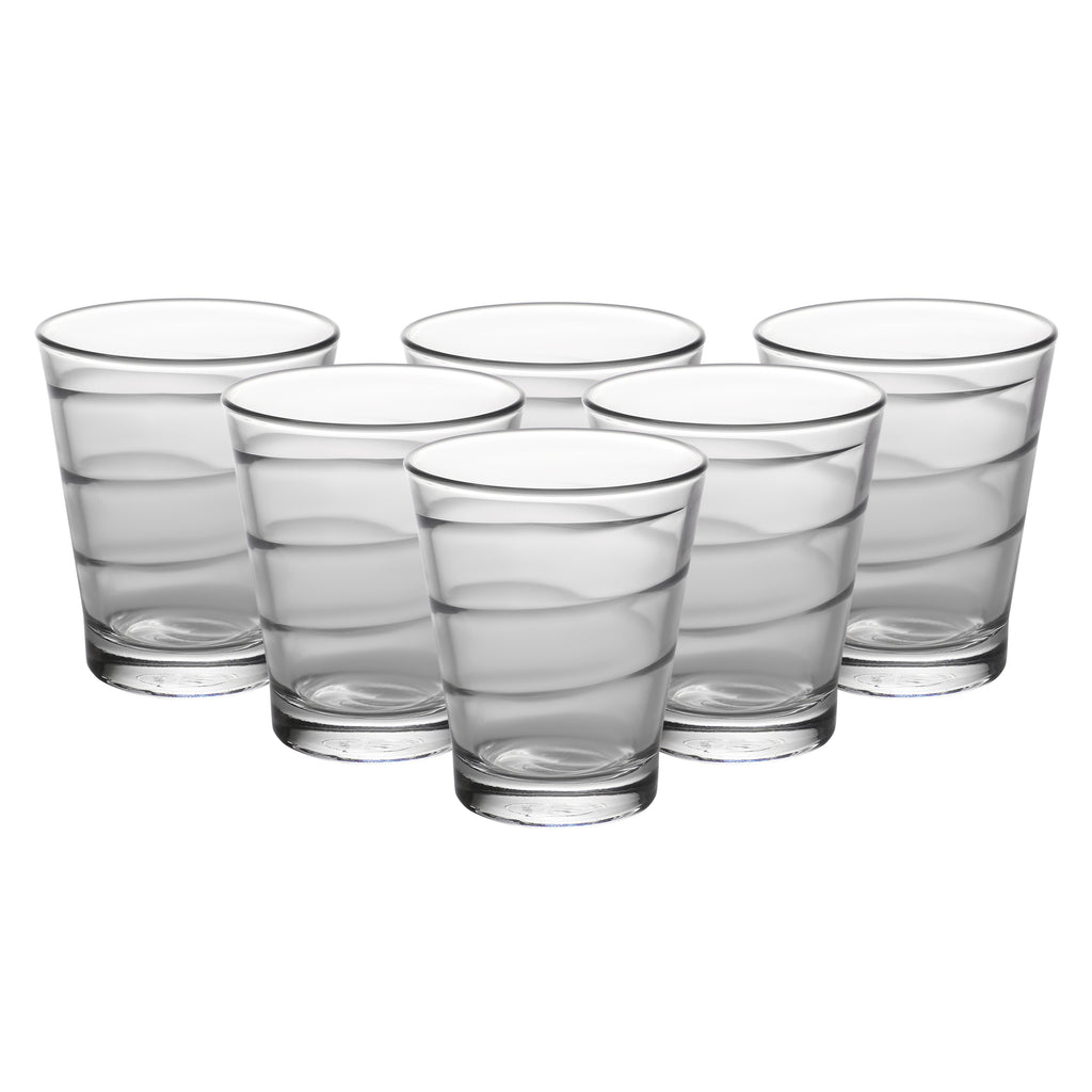 Enhance your drinking experience with this tumbler glass set from the house of Duralex. It features a textured pattern and is blended in a beautiful tone. It is crafted with utmost precision from glass. As it is both hot and cold resistant, it can go straight from the freezer to the microwave. Extremely durable and tempered, the glass is impact and chip resistant. It has a capacity of 300 ml. made in france duralex spirale clear drinking glass used for water whiskey juice tea