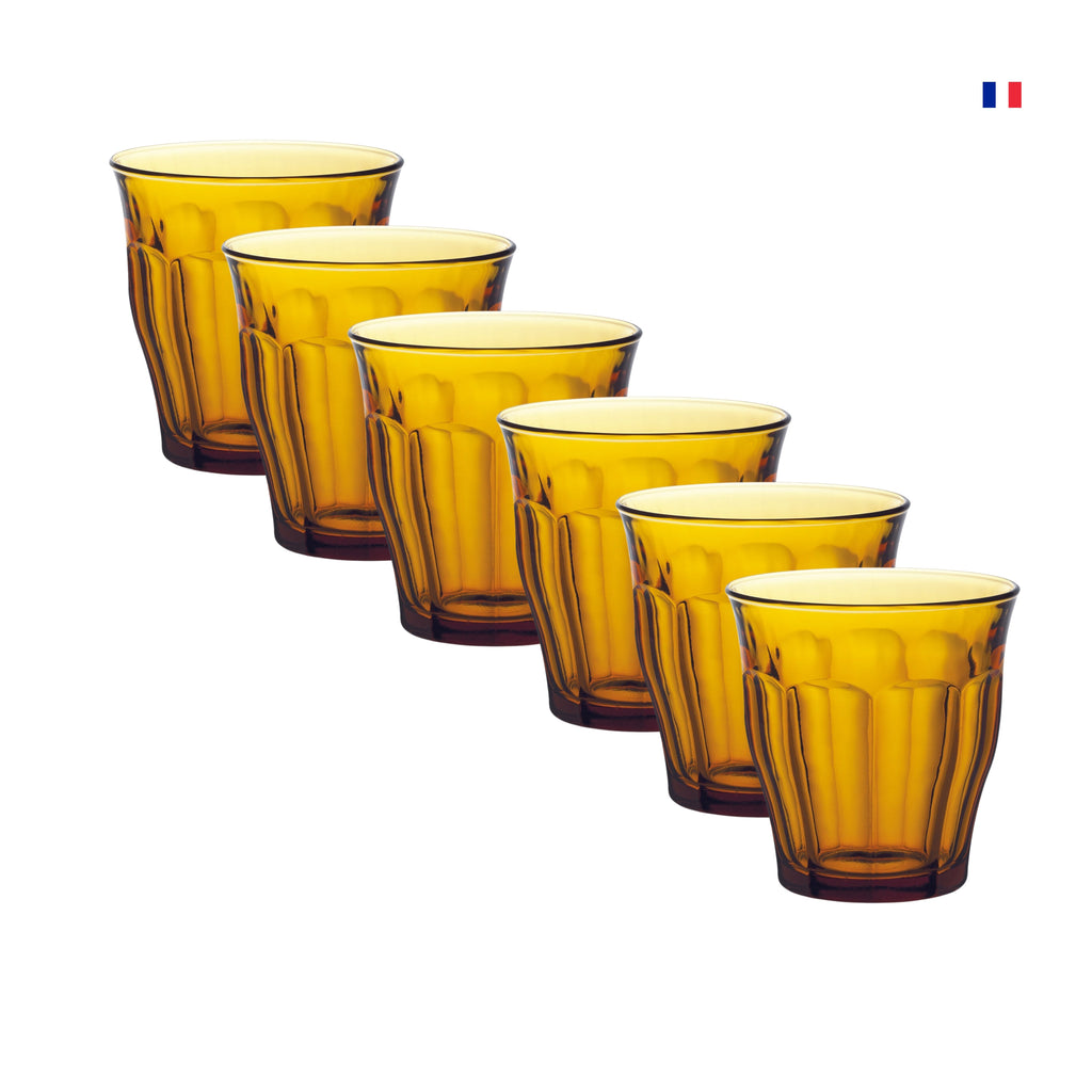 Shop Picardie Amber Tumbler at an affordable price. Get the perfect set of glassware for your home, whether it's whisky, coffee, tea, or juice glasses. Enjoy quality and value with our durable and elegant selection. Duralex Picardie Amber Tumbler/Glass 250ml Set of 6 Pieces