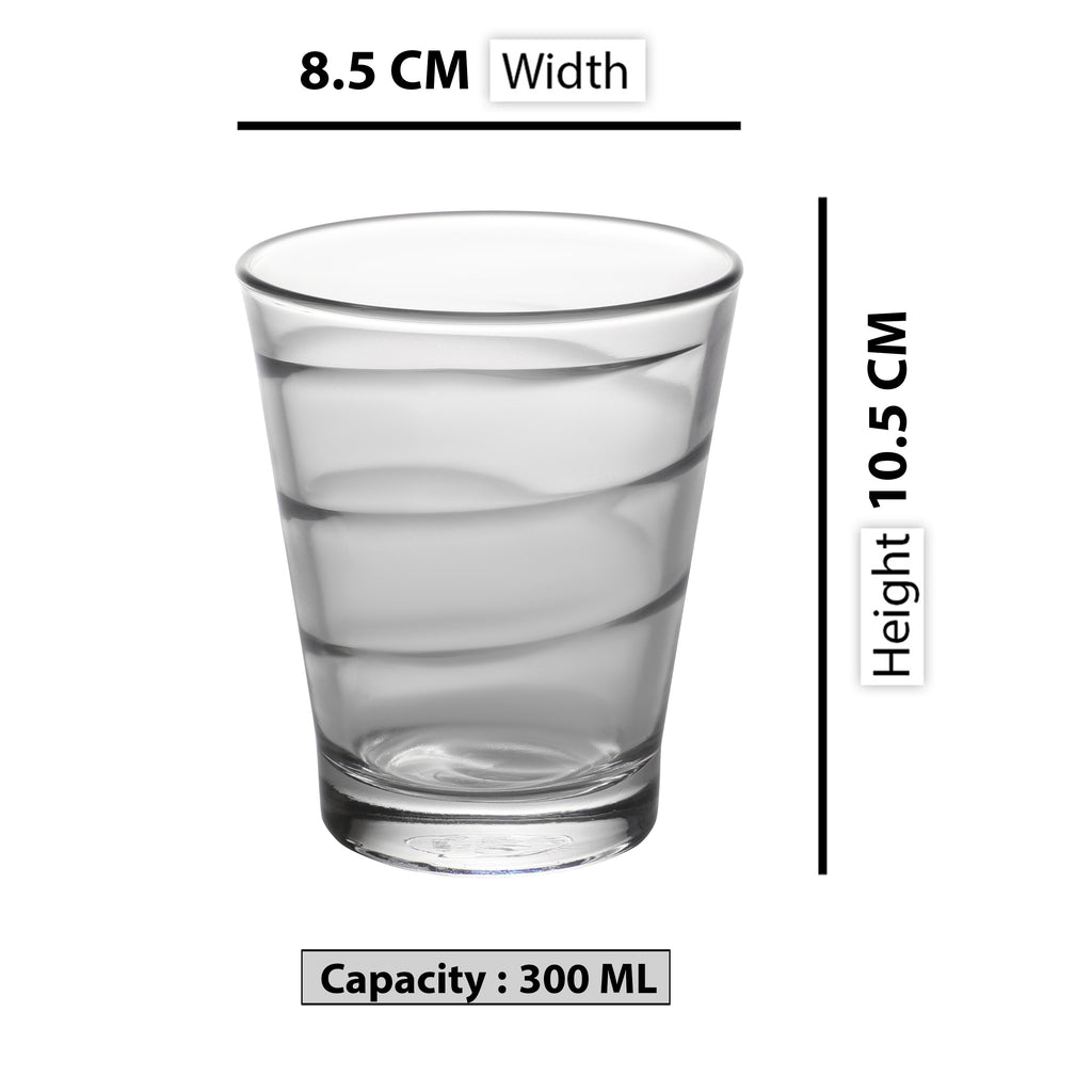 Enhance your drinking experience with this tumbler glass set from the house of Duralex. It features a textured pattern and is blended in a beautiful tone. It is crafted with utmost precision from glass. As it is both hot and cold resistant, it can go straight from the freezer to the microwave. Extremely durable and tempered, the glass is impact and chip resistant. It has a capacity of 300 ml. made in france duralex spirale clear drinking glass used for water whiskey juice tea