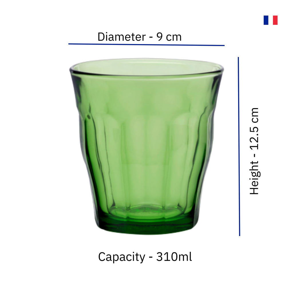 Enhance your whiskey, water, juice, tea, drinking experience with this Duralex Picardie Green tumbler Glass set of 6 from the house of Duralex. It features a textured pattern and is blended in a beautiful tone. It is crafted with utmost precision from glass. As it is both hot and cold resistant, it can go straight from the freezer to the microwave. Extremely durable and tempered, the glass is impact and chip resistant. It has a capacity of 310 ml. 